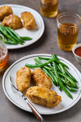 Portion of baked fried chicken