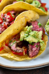 Skirt steak tacos with corn tortillas