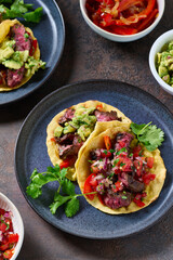 Skirt steak tacos with corn tortillas