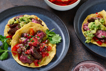 Skirt steak tacos with corn tortillas