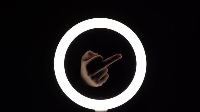 gesture package. female hands close-up make figures from fingers. finger play. Middle finger up. Obscene gesture fuck yourself