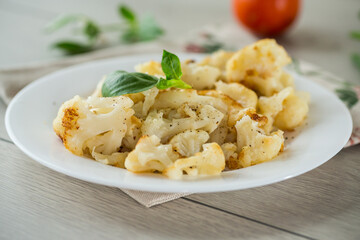 Diet boiled cauliflower fried in oil with spices