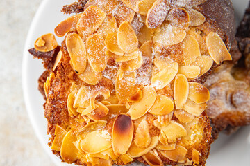 Brioche sweet almond french toast fresh tasty food dish delicious gourmet food background on the table rustic food top view copy space