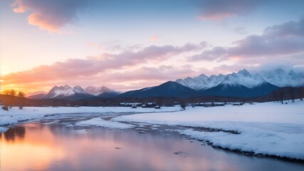 Winter landscape with a river and mountains in the distance at sunset