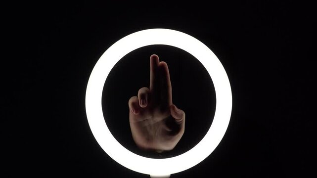 gesture package. female hands close-up make figures from fingers. finger play. finger pistol imitation. Palm gun