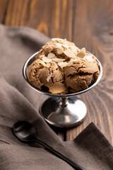 Balls of nut ice cream in a metal creamer