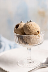 Coffee ice cream balls with notes of lavender in a beautiful cream bowl