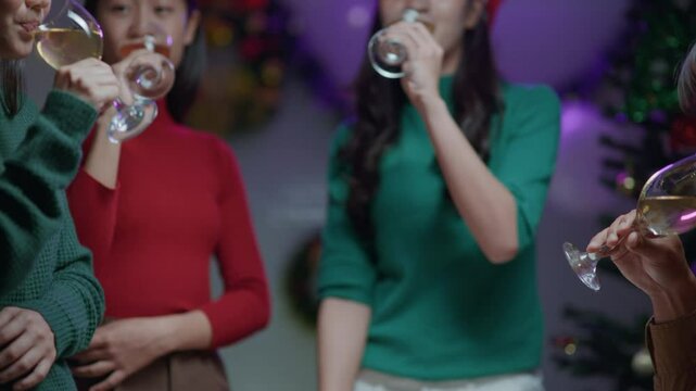 Friends join and celebrate the party with get cheers give a toast by clink glasses eating foods and drinks champagne. Happy and joyful in holiday weekend and festival.