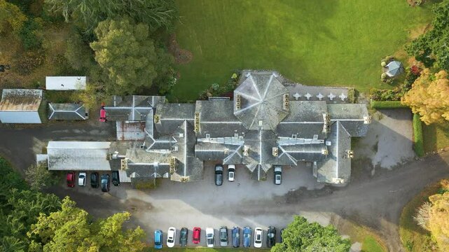 luxurious country house estate england mansion hotel richness property top down birdseye aerial drone shot view luxury uk footage 