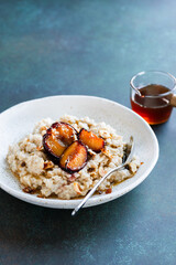 Oatmeal with baked plums