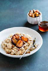 Oatmeal with baked plums