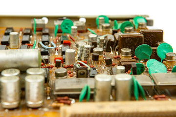 Parts and components on printed circuit boards close-up Electronic board with radio parts from...