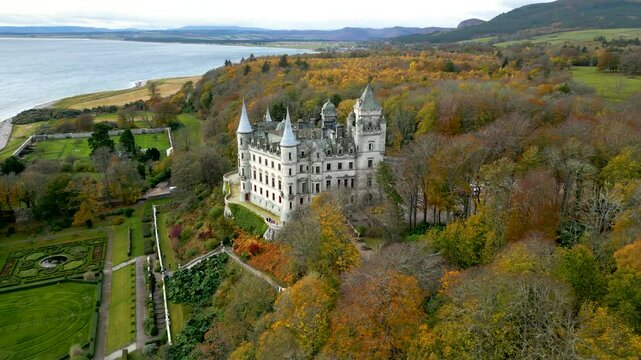 dunrobin castle gardens during autumn luxurious estate medieval architecture beautiful landscaping making significant aerial view scotland landmark historical site 