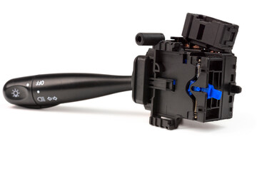 Close-up. Switches the direction indicator switch lever, also turns on the lighting, selective focus. Road safety