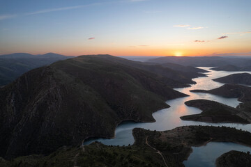 Amazing abstract landscape of Sabor lake, Tras os Montes  Portugal. Drone vision, aerial view of Serpente do Medal, Sabor River, tourist attraction and travel destination in Northern Portugal. © aroxopt