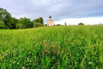 Church of Intercession upon Nerl River 12th century. (Bogolyubovo, Vladimir region, Golden Ring of Russia) A warm summer evening. historical and cultural heritage of Russia.