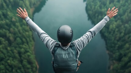 Adventurous solo traveler embraces nature with open arms over scenic gorge