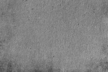Fototapeta premium Dark grunge gray texture of rough old stained paper or concrete