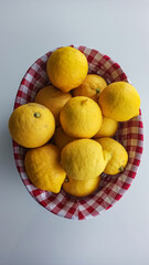 yellow lemons in a basket 