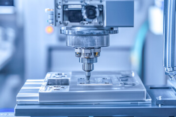 Fototapeta premium Thermoforming process, where heated plastic sheets are being shaped into products using molds