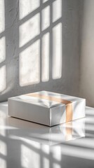 Food box mockup with a modern design on a reflective white surface under studio lights