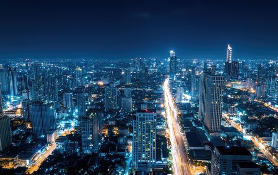 A vibrant night view of Bangkok's skyline showcasing smart city technology and digital connectivity advancements