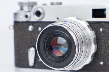 Old vintage camera. Lens close-up.