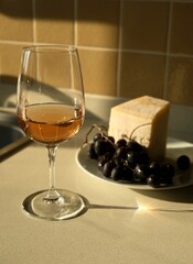 white wine with grapes and cheese