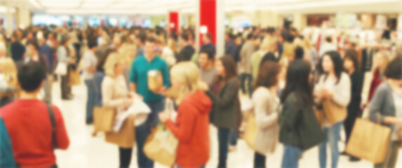 Fototapeta premium Blurred background of an excitement of Black Friday shopping is captured in this image, black friday, shopping