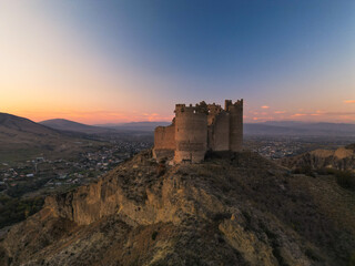  Fantasy breathtaking castle on top of mountain at sunset in Georgia Ksani