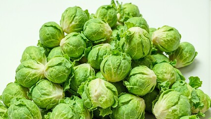 Fototapeta premium Freshly picked Brussels sprouts showcasing intricate textures on a clean backdrop