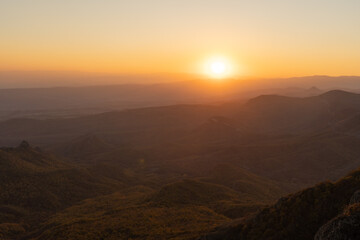 Autumn mountain forest at sunset - photo wallpaper background, georgia