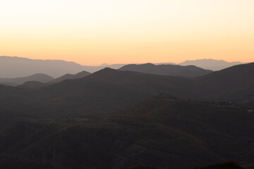 Obraz premium Autumn mountain forest at sunset - photo wallpaper background, georgia