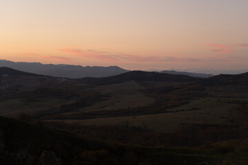 Fototapeta premium sunset in autumn mountains in georgia