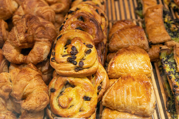 Various assortment of desserts confectionery on the counter in a bakery