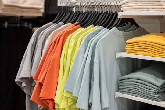 Assorted Color T-shirts on Retail Store Display Rack