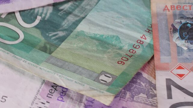 A heap of Serbian dinar paper currency, 1000, 2000 and 5000 dinars value. Serbian money as backgrounds.