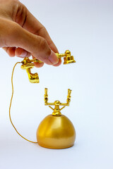 Nostalgic Elegance: The handset’s curves and embellishments exude sophistication, making this...