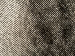 Macro photography of fabric texture, detailing soft waves and patterns, creating an impression of...