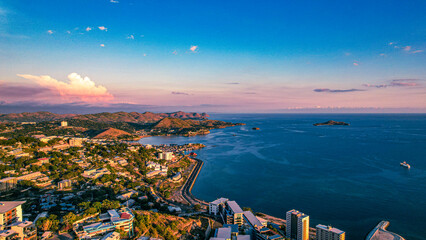 Beautiful view of Port Moresby South from above with the fish market and houses over the water and...