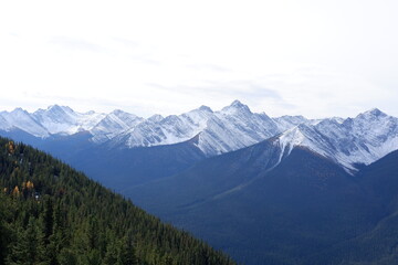 Photo of the Sundance Range with Mount Bourgeau, Mount Brett, Pilot Peak and Mount Temple in Banff National Park in Alberta, Canada.