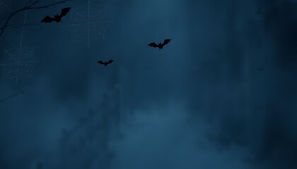 Fototapeta premium A spooky yet minimalist wallpaper featuring faint spider webs and soft bats in shades of black and dark blue, with a subtle mist effect for an eerie Halloween look.