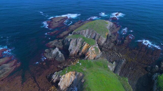 Aerial view from a drone of the coastal landscape and crops in the area around Cabo Cebes in Tapia de Casariego. Asturias. Spain. Europe