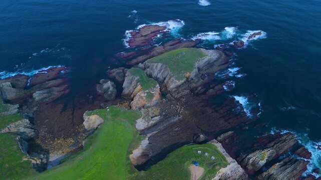 Aerial view from a drone of the coastal landscape and crops in the area around Cabo Cebes in Tapia de Casariego. Asturias. Spain. Europe