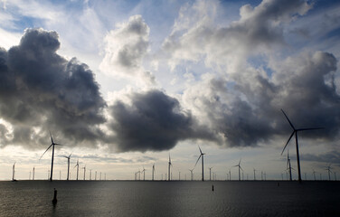 View of an offshore windpark and a beautiful cloudscape