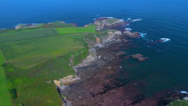 Aerial view from a drone of the coastal landscape and crops in the area around Cabo Cebes in Tapia de Casariego. Asturias. Spain. Europe