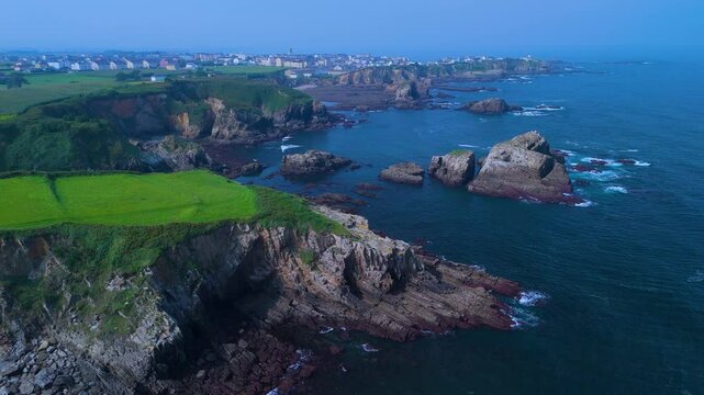 Aerial view from a drone of the coastal landscape and crops in the area around Cabo Cebes in Tapia de Casariego. Asturias. Spain. Europe