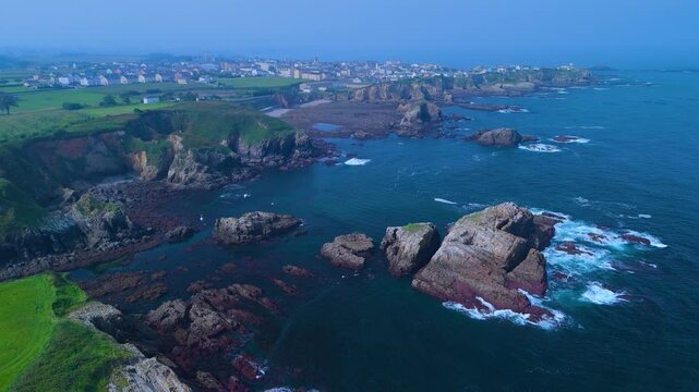 Aerial view from a drone of the coastal landscape and crops in the area around Cabo Cebes in Tapia de Casariego. Asturias. Spain. Europe