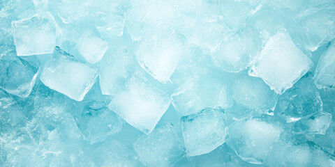 Obraz premium Close-up view of ice cubes with a cool, refreshing blue tone. Ideal for beverage-related projects or advertisements.