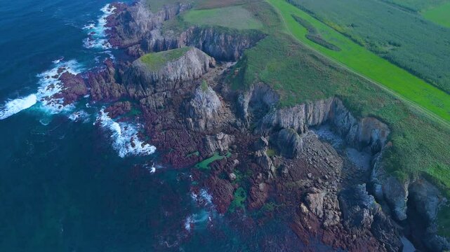 Aerial view from a drone of the coastal landscape and crops in the area around Cabo Cebes in Tapia de Casariego. Asturias. Spain. Europe